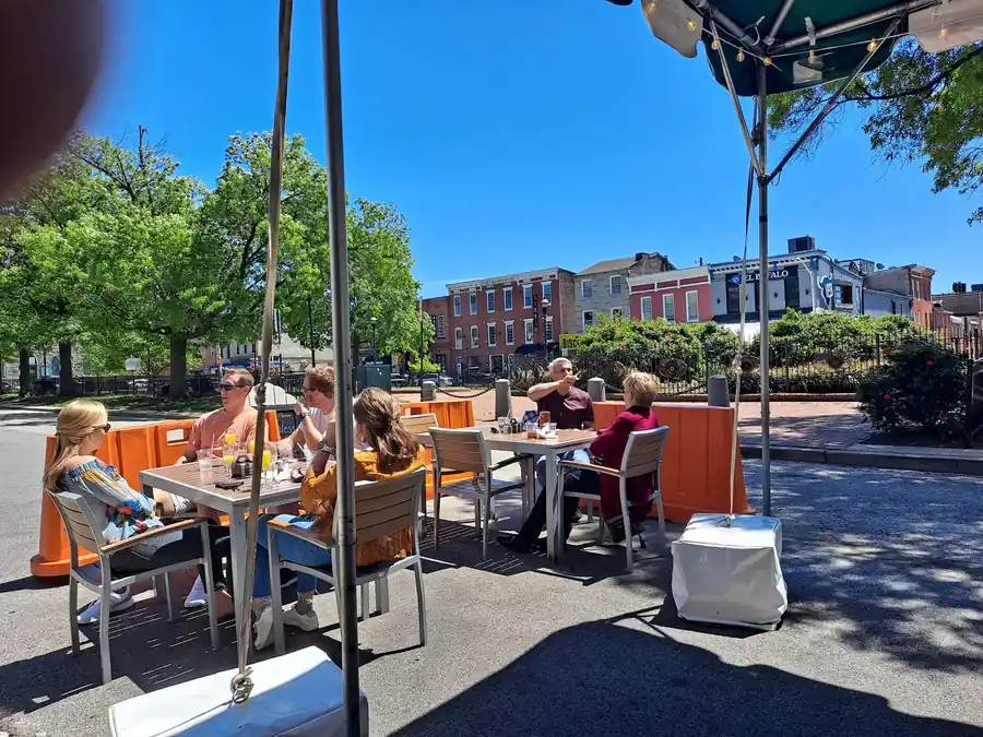 Tables out on the patio in afternoon sun