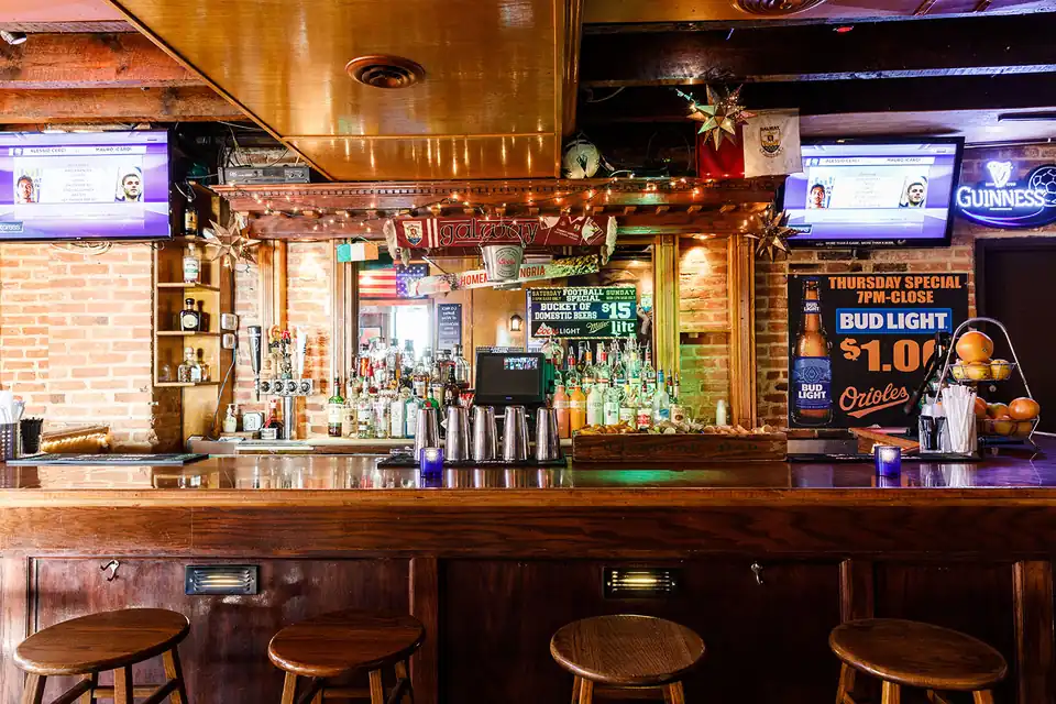 Claddagh Pub's main bar, taps and back bar, where Roy and Nyiae pour